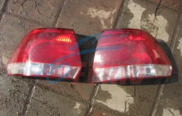 Фонарь левый для Volkswagen Polo 2013 года на фотографиях