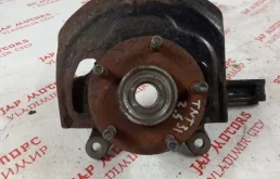 Кулак поворотный правый для Nissan X-Trail 2012 года на фотографиях