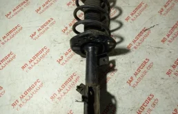 Амортизатор передний левый для Nissan Qashqai 2012 года на фотографиях