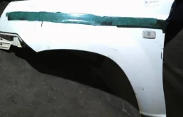Крыло левое для Nissan X-Trail 2003 года на фотографиях