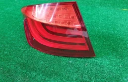 Фонарь левый для BMW 5er 2013 года на фотографиях