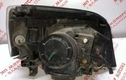 Фара ксенон левая для Nissan X-Trail 2004 года на фотографиях