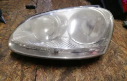 Фара левая для Volkswagen Jetta 2009 года на фотографиях