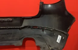 Фартук (спойлер) заднего бампера для Volkswagen Tiguan 2010 года на фотографиях