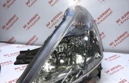 Фара левая для Nissan Teana 2010 года на фотографиях