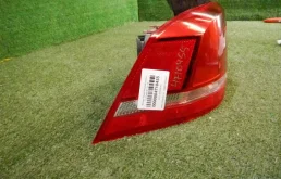 Фонарь внешний левый для Volkswagen Passat 2012 года на фотографиях