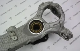 Кулак поворотный левый для Porsche Panamera 2016 года на фотографиях