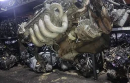 Двигатель без навесного для Mazda Familia 1999 года на фотографиях