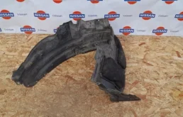 Подкрылок передний левый для Nissan X-Trail 2004 года на фотографиях