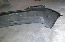 Бампер задний для Nissan Almera 2002 года на фотографиях