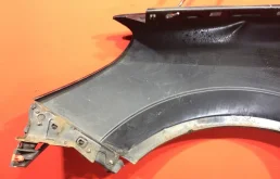 Крыло левое для Opel Astra 2006 года на фотографиях