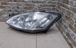 Фара левая для Mercedes-Benz S class 2005 года на фотографиях