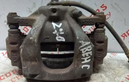 Суппорт передний левый для Toyota Avensis на фотографиях