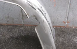 Накладка переднего бампера для Suzuki Liana 2005 года на фотографиях