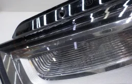 Фара левая для Audi A6 2010 года на фотографиях