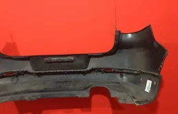 Фартук (спойлер) заднего бампера для Volkswagen Tiguan 2010 года на фотографиях