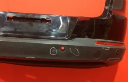 Фартук (спойлер) заднего бампера для Volkswagen Tiguan 2010 года на фотографиях