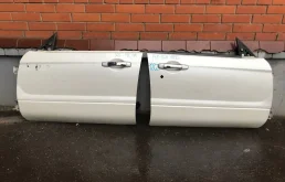 Двери для Subaru Forester 2004 года на фотографиях