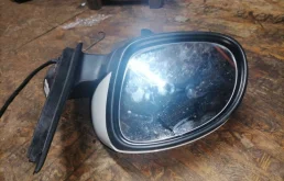 Стекла и зеркала для Volkswagen Tiguan 2010 года на фотографиях