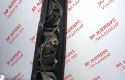 Фонарь левый для Nissan X-Trail 2001 года на фотографиях