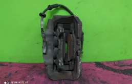 Суппорт передний левый для Audi A6 2010 года на фотографиях