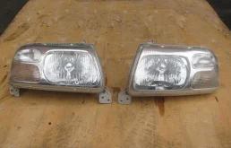 Фары для Suzuki Grand Vitara 2004 года на фотографиях