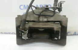 Суппорт передний левый для Audi A6 2008 года на фотографиях