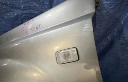 Крыло левое для Nissan X-Trail 2000 года на фотографиях