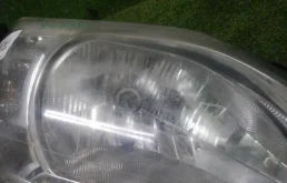 Фара ксенон левая для Renault Logan 2008 года на фотографиях