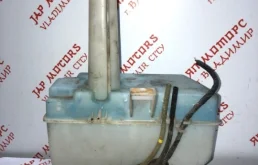 Бачок омывателя для Nissan X-Trail 2003 года на фотографиях