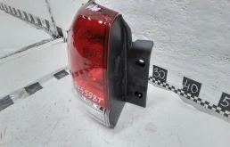 Фонарь внешний левый для Toyota Land Cruiser 2008 года на фотографиях