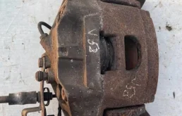 Суппорт передний левый для Audi A6 на фотографиях