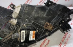 Фара левая для Nissan Teana 2010 года на фотографиях