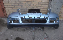 Бампер для Volkswagen Passat 2006 года на фотографиях