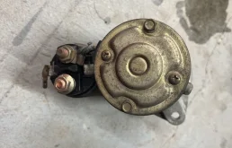 Стартер для Mitsubishi Lancer 2004 года на фотографиях