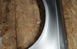 Крыло левое для Audi A6 2008 года на фотографиях