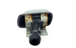 Форсунка фароомывателя левая для Nissan X-Trail 2013 года на фотографиях