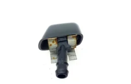 Форсунка фароомывателя левая для Nissan X-Trail 2013 года на фотографиях