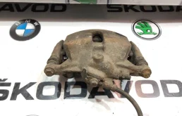 Суппорт передний левый для Skoda Octavia 2013 года на фотографиях