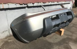 Бампер передний для Nissan X-Trail 2000 года на фотографиях