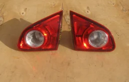 Фонарь внутренний левый для Nissan Qashqai 2010 года на фотографиях