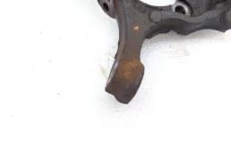 Кулак поворотный левый для Nissan X-Trail 2014 года на фотографиях