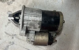 Стартер для Mitsubishi Lancer 2004 года на фотографиях