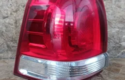 Фонарь внешний левый для Toyota Land Cruiser 2008 года на фотографиях