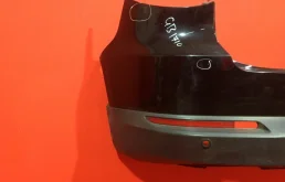 Фартук (спойлер) заднего бампера для Volkswagen Tiguan 2010 года на фотографиях