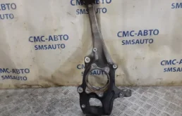 Кулак поворотный левый для Audi A4 2006 года на фотографиях