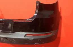 Фартук (спойлер) заднего бампера для Volkswagen Tiguan 2010 года на фотографиях