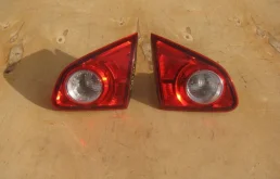 Фонарь внутренний левый для Nissan Qashqai 2010 года на фотографиях