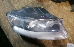 Фара левая для Audi A6 2001 года на фотографиях