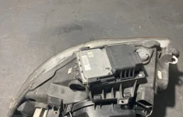 Фара ксенон левая для BMW 1er 2009 года на фотографиях